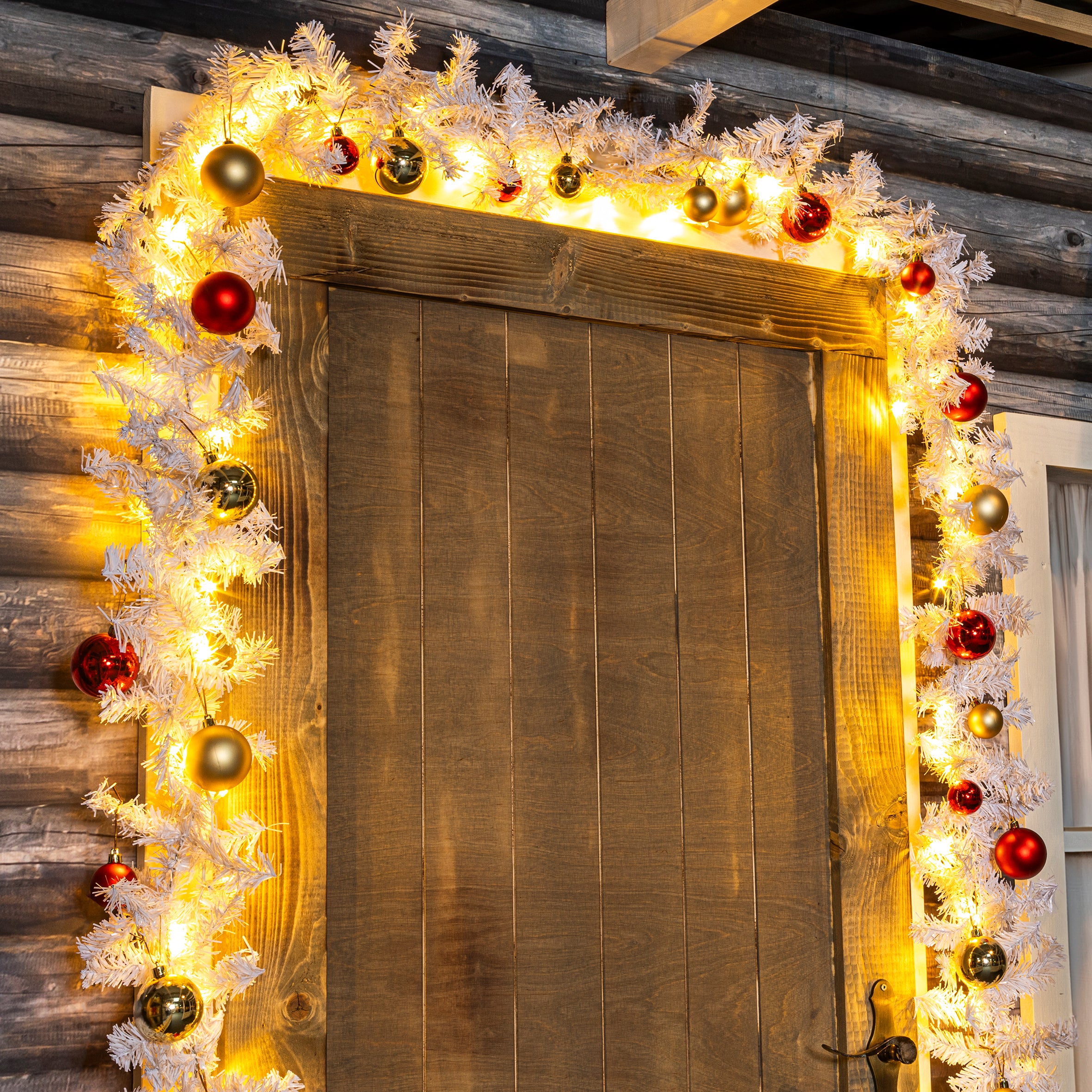 Künstliche Weihnachtsgirlande mit Beleuchtung 5 Meter, mit Kugeln weiß, innen und außen